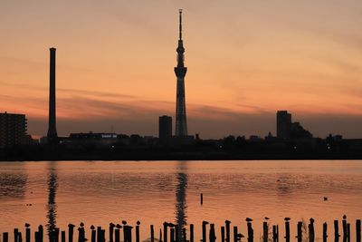 Silhouette of buildings at waterfront