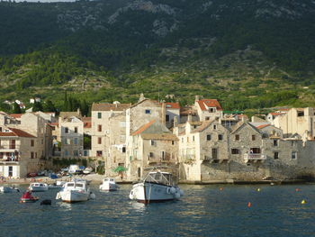 View of boats moored at harbor