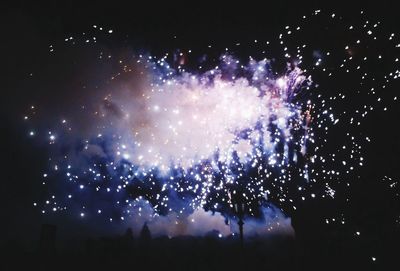 Low angle view of firework display