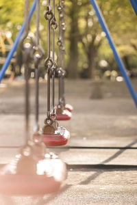 Close-up of swing in playground