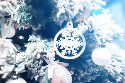 Close-up of christmas decoration hanging on tree