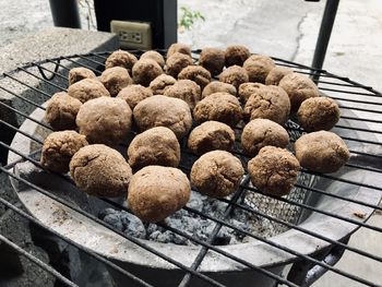 High angle view of sausages on barbecue grill