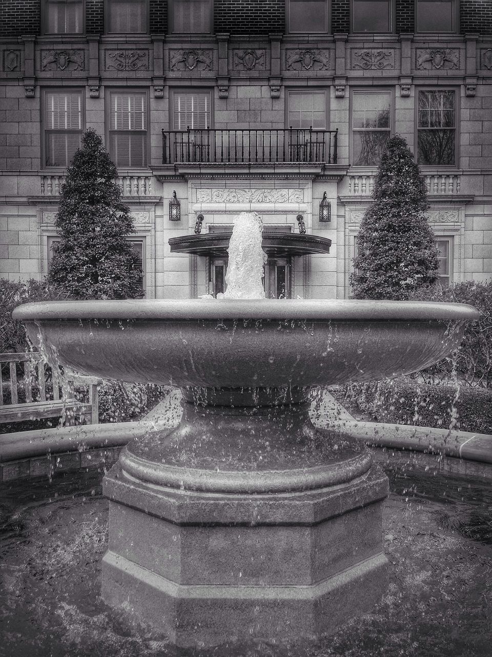 fountain, architecture, building exterior, built structure, water, statue, sculpture, motion, art and craft, art, spraying, city, human representation, pond, travel destinations, creativity, building, tree, park - man made space, outdoors