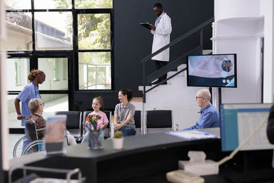 High angle view of business people working at office