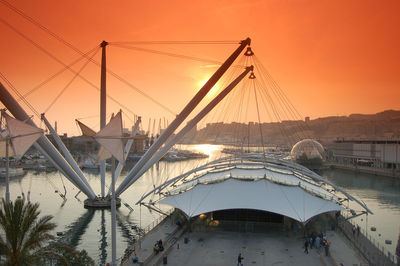 Bridge over river during sunset