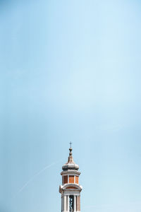 Low angle view of building against blue sky