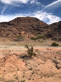 Scenic view of land against sky