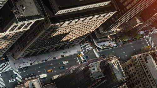 High angle view of street amidst buildings in city