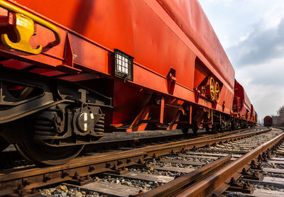 Train on railroad track against sky