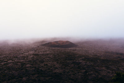 Scenic view of volcano landscape against sky