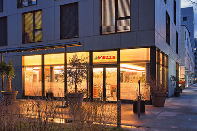 Buildings in city at night