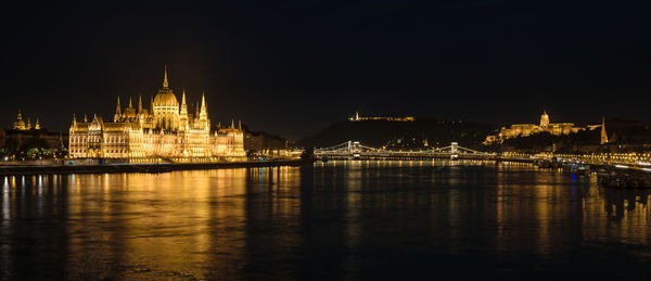 Illuminated city lit up at night