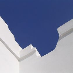 Low angle view of building against blue sky