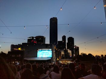 Crowd in city at night