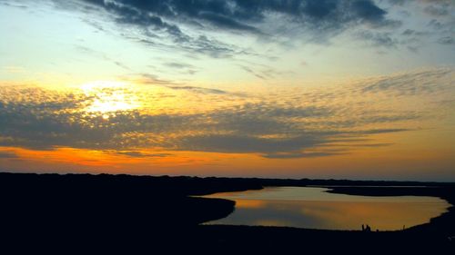 Scenic view of dramatic sky during sunset