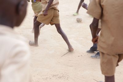 High angle view of students playing on schoolyard