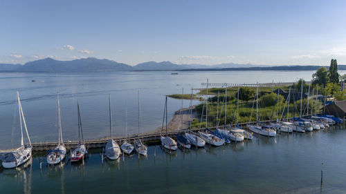 Boats moored at harbor