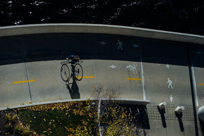 Man on bicycle at velodrome