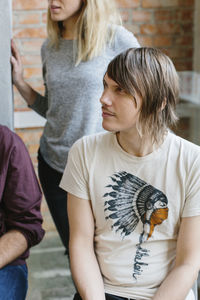 Colleagues listening during meeting in office