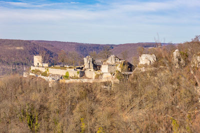 Panoramic view of castle on field against sky