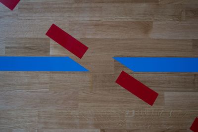 Close-up of symbols on wooden floor