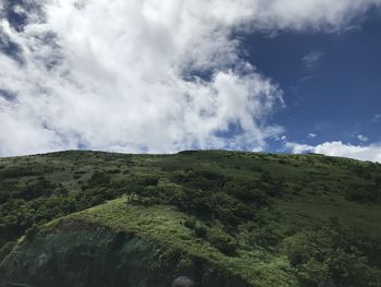 Low angle view of land against sky