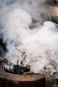 Close-up of smoke emitting from clouds