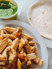 High angle view of meal served in plate, fajitas mexican