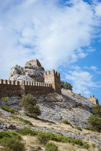 Low angle view of historic building against sky