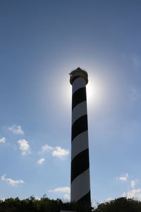 Low angle view of lighthouse against blue sky