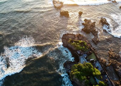 High angle view of rocks at beach