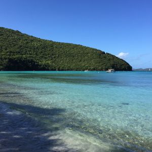 Scenic view of sea against clear blue sky