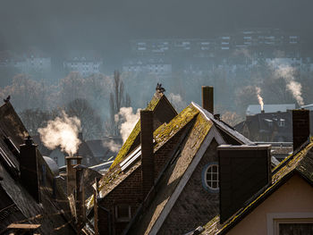 Panoramic view of buildings and city against sky