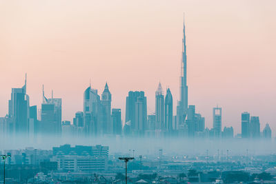 Dubai city skyline at morning fog