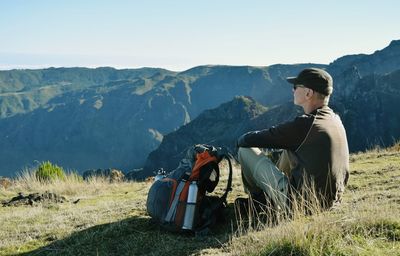 Man looking at mountains