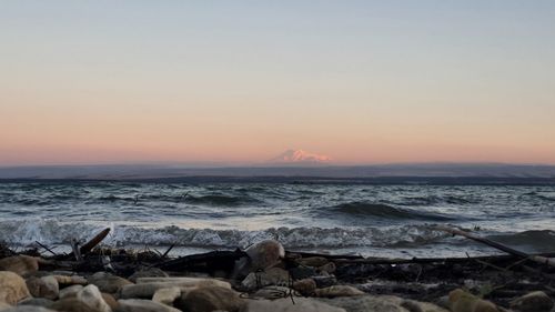 Scenic view of sea against sky during sunset