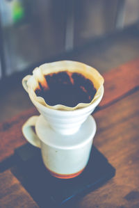 Close-up of tea cup on table