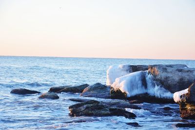 Scenic view of sea against clear sky