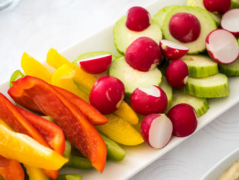 High angle view of fruits in plate on table