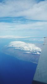 Aerial view of clouds over sea seen from airplane