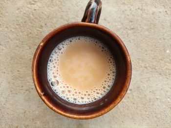 High angle view of coffee cup on table