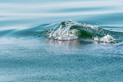 Sea waves splashing on shore