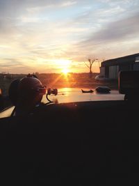 Silhouette of built structures at sunset