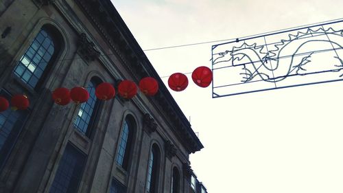 Low angle view of street light against sky
