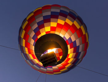 Low angle view of hot air balloon against clear sky