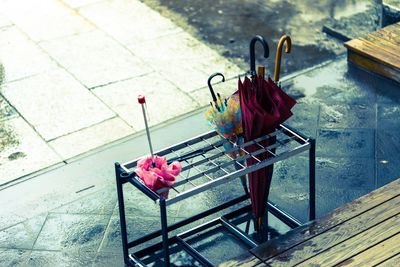 High angle view of umbrellas in rack