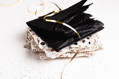 High angle view of chocolate cake on table against white background