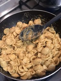 High angle view of meat in cooking pan