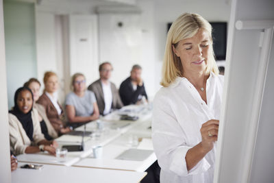 Woman having presentation at business meeting