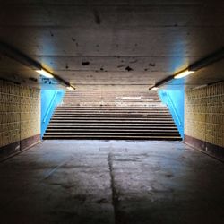 Empty walkway along walls